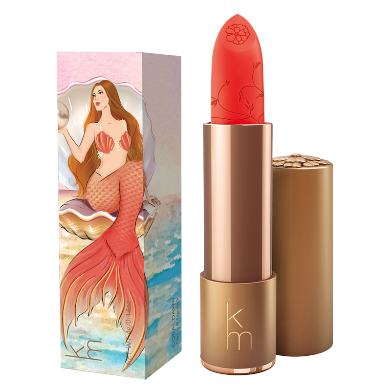 Red lipstick with gold cap and mermaid-themed packaging on a white background