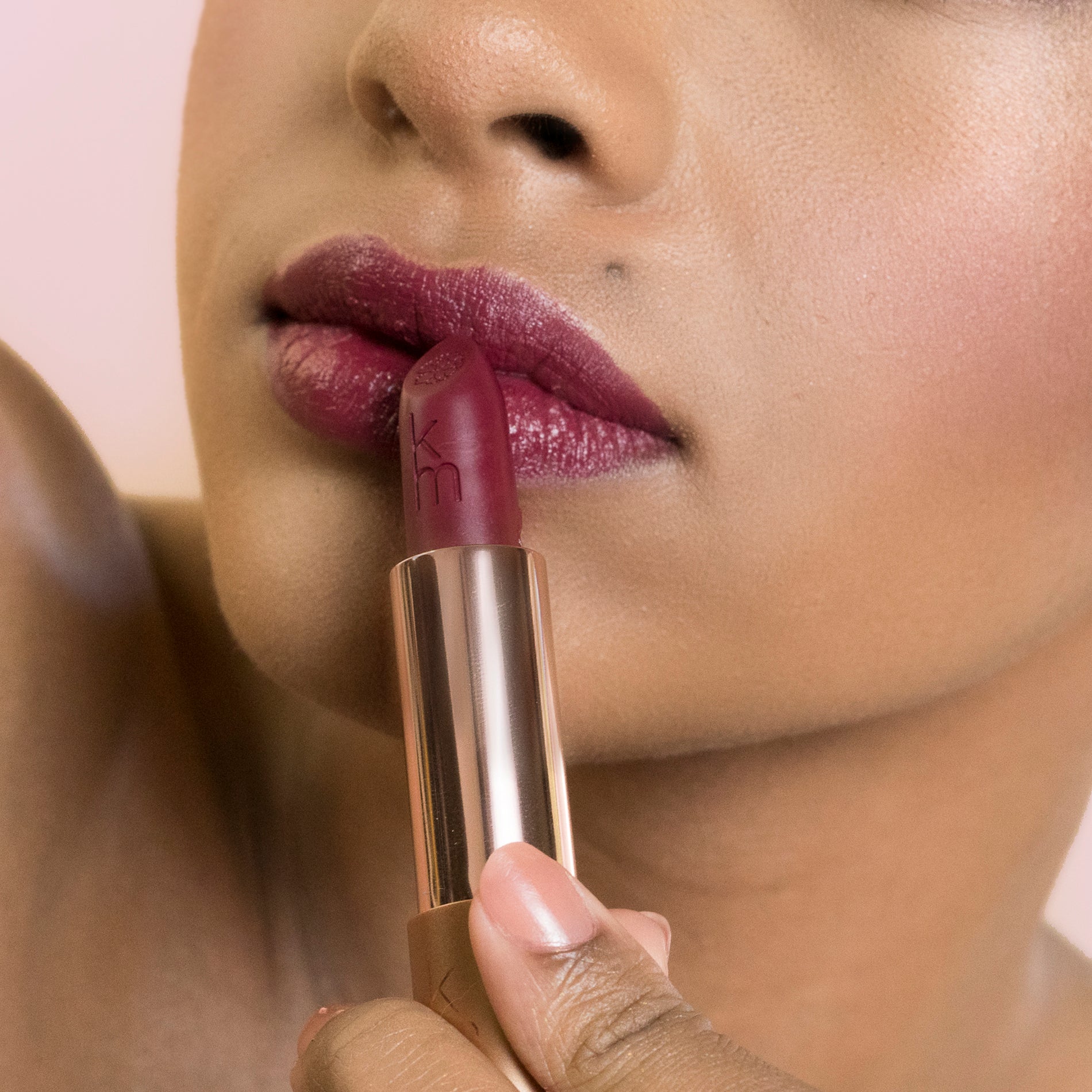11 Scarlet Blaze - Natural Lipstick on model lips, deep skin tone
