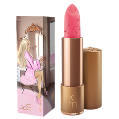 Pink lipstick with gold casing and matching packaging on a white background