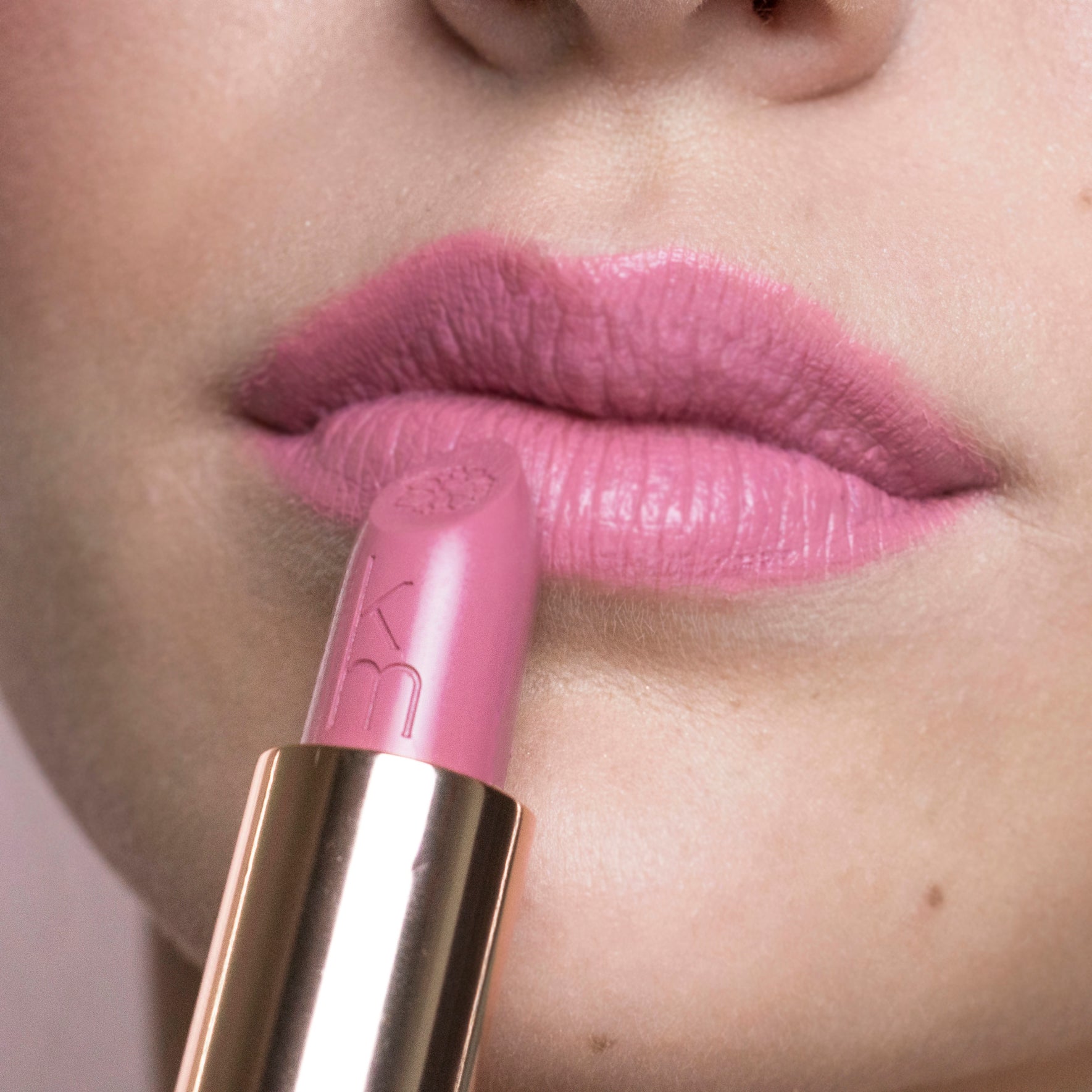 light pink lipstick on lips 